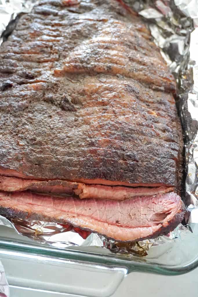 a slab of brisket, sliced