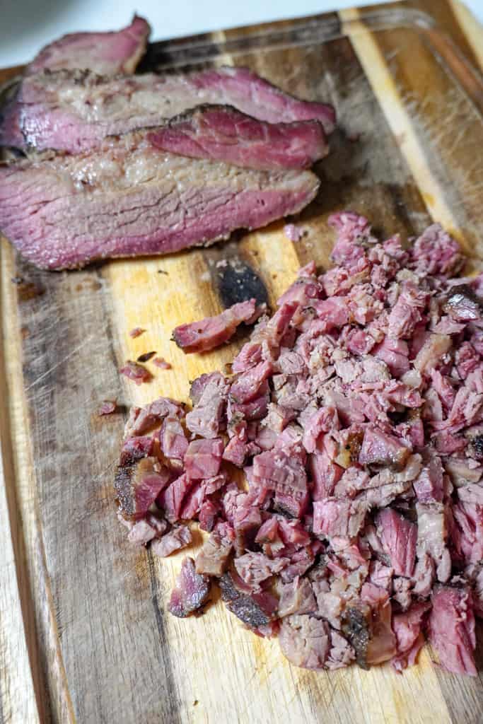 chopped brisket on a cutting board