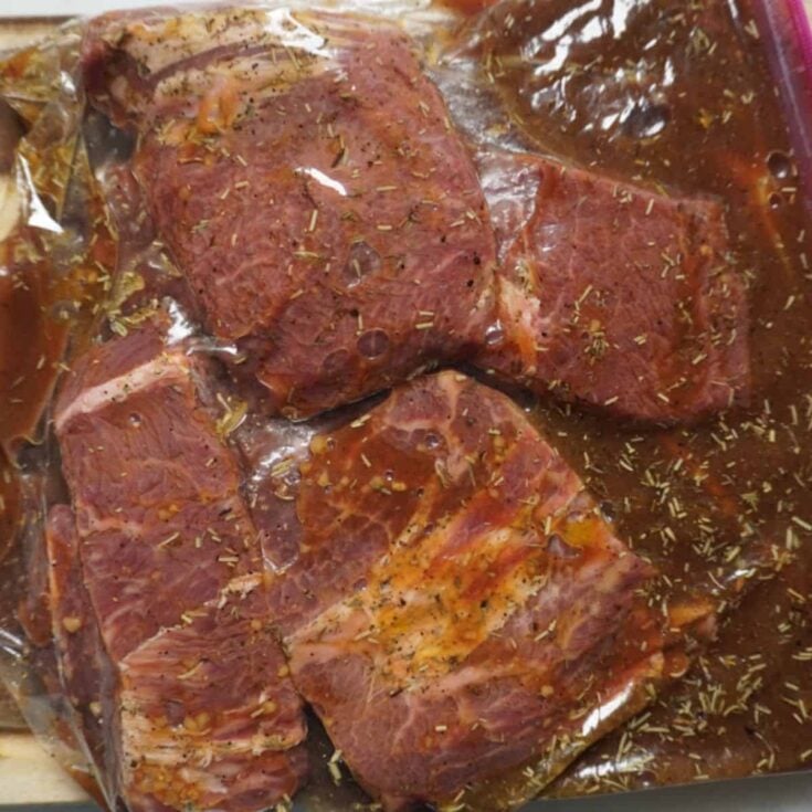 steak marinating in a bag