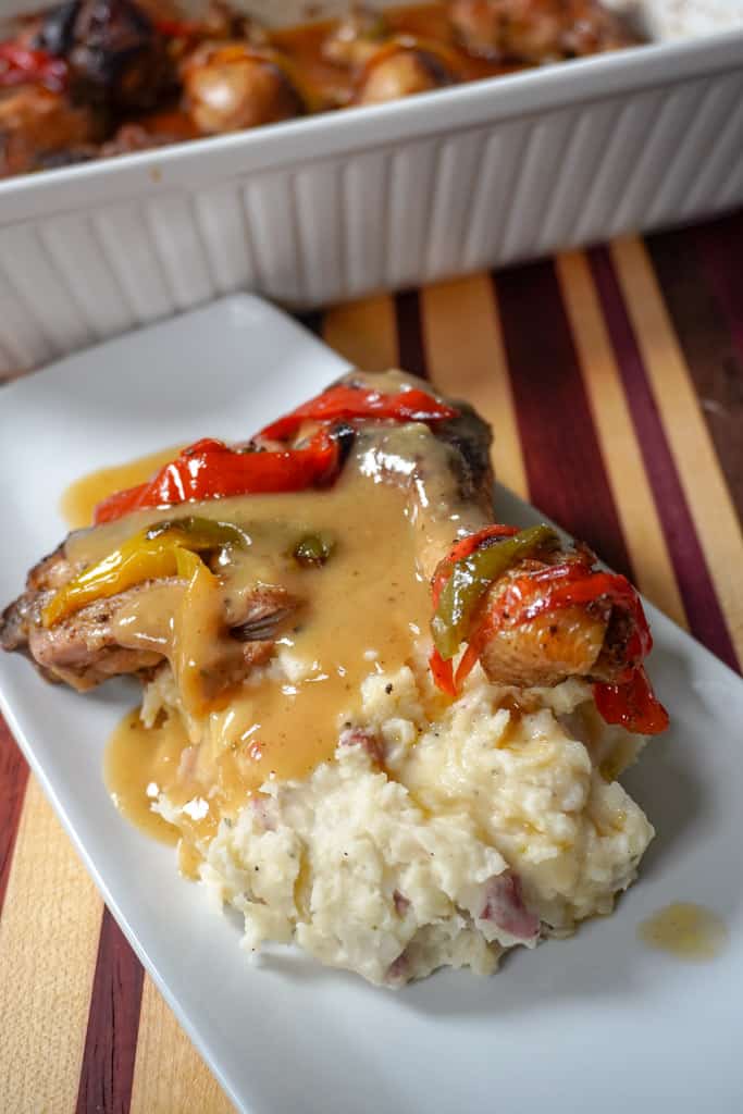 plated smothered chicken and mashed potatoes