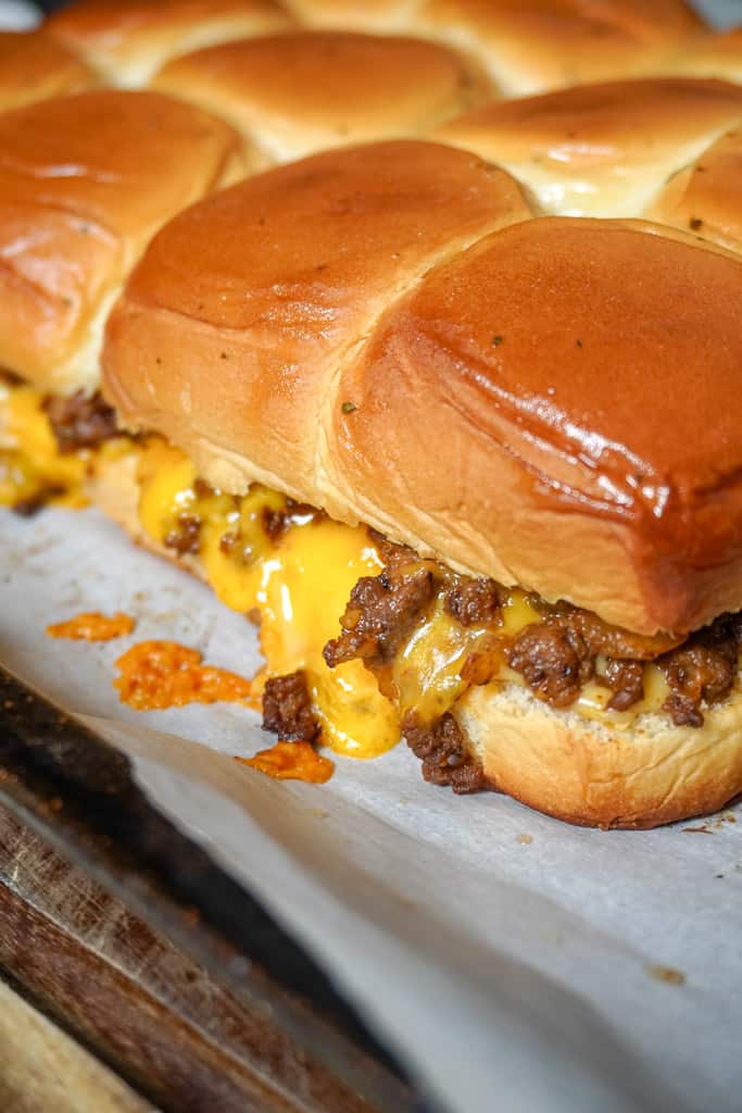 close up view of hawaiian roll cheeseburger sliders