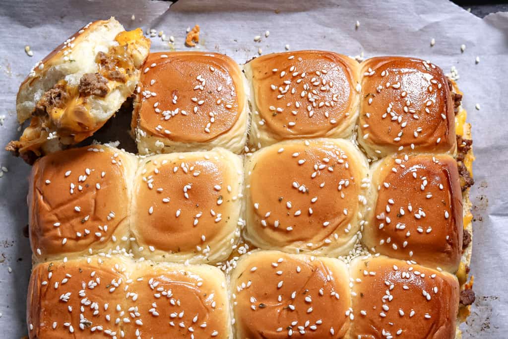 cheeseburger sliders on parchment paper