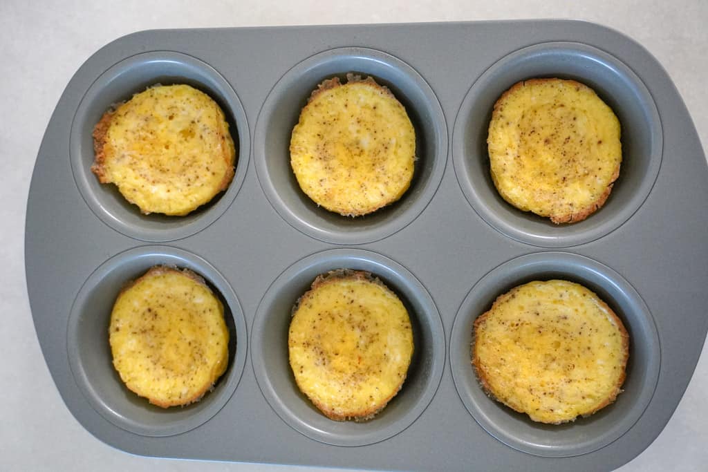 cooked eggs in a muffin pan