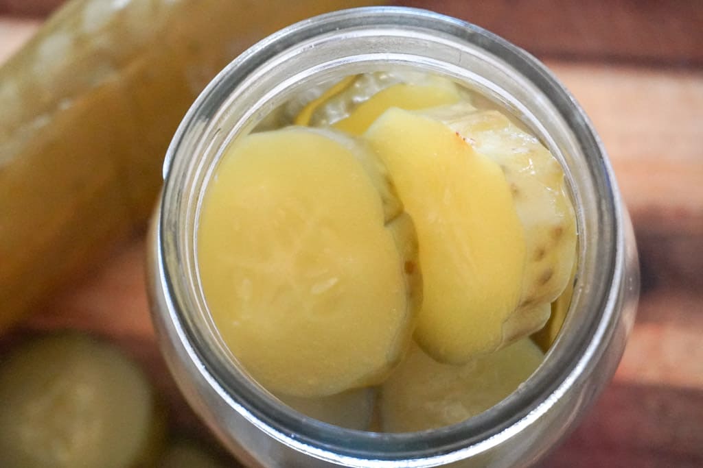 sliced pickles in a jar