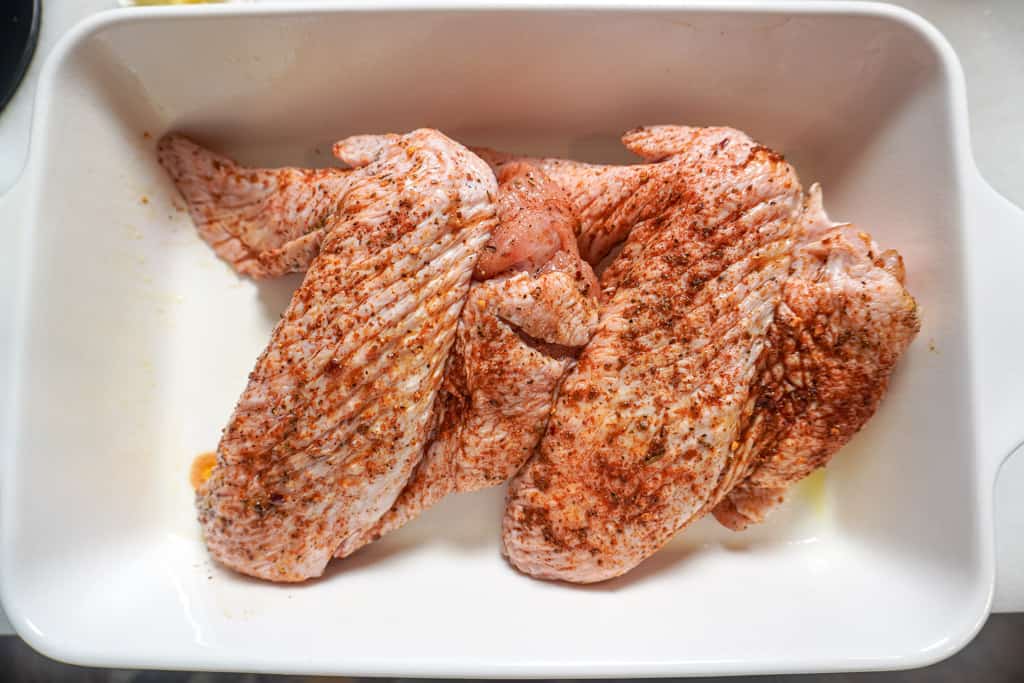 seasoned turkey wings in a baking dish