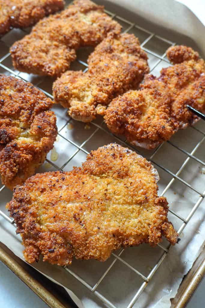 fried chicken katsu cooling on a wire rack