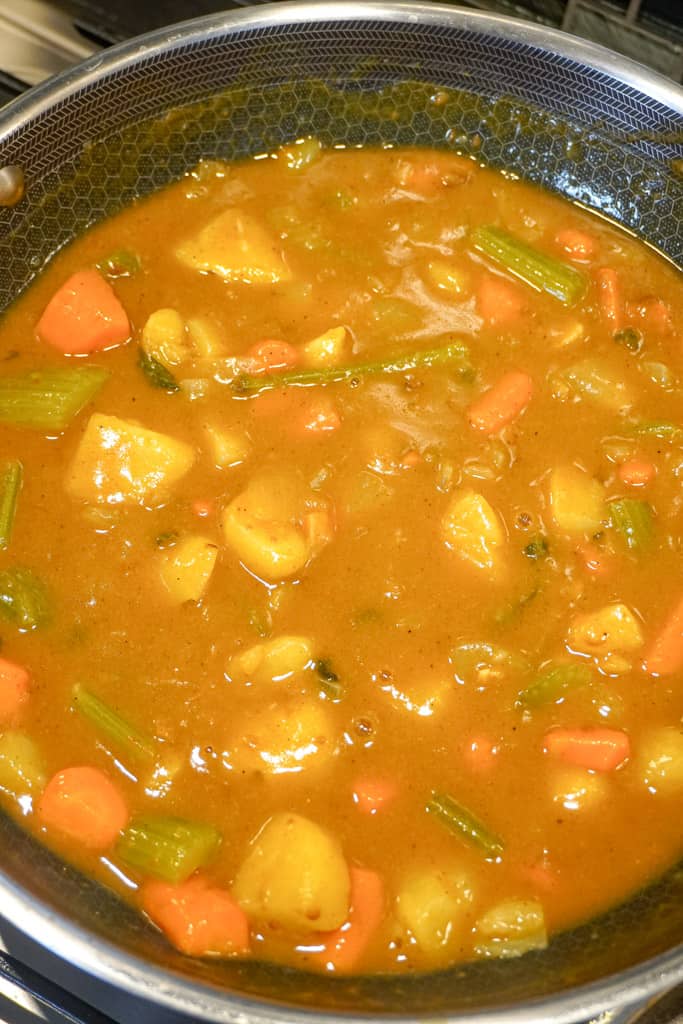 curry vegetables in a skillet