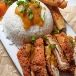 plated chicken katsu with white rice