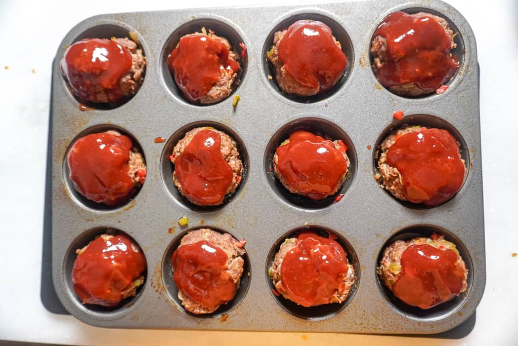 glazed mini meatloaf in a muffin pan
