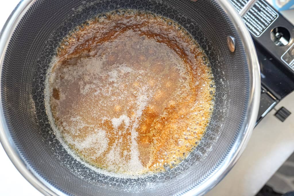 butter and sugar caramelizing in a pot