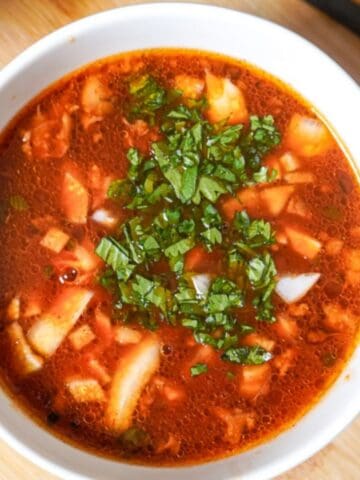 close up view of a bowl of consome