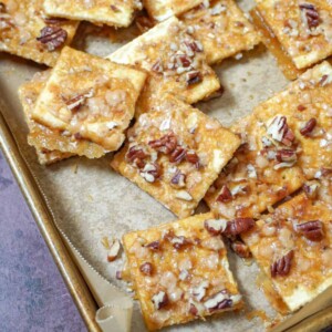 close up view of toffee cookies on a baking sheet
