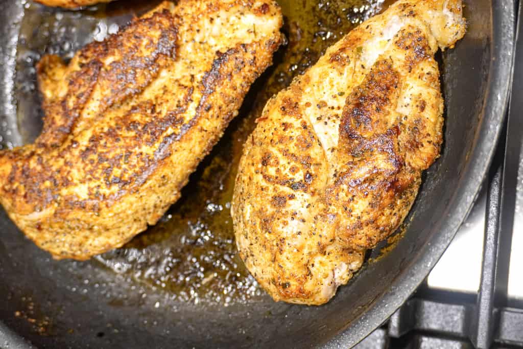grilled chicken breast in a skillet