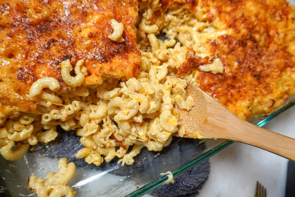 southern macaroni and cheese cut to reveal the cheesy noodles underneath
