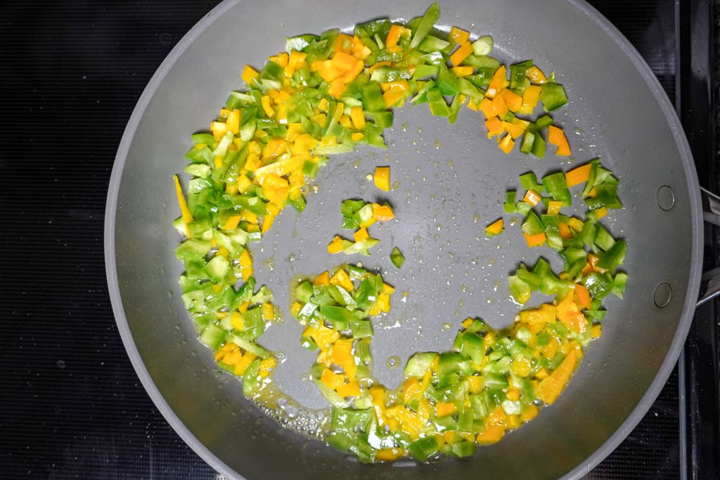 sautéed bell peppers in a skillet