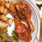 close up of bbq baked chicken legs