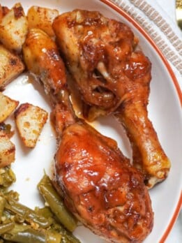 close up of bbq baked chicken legs