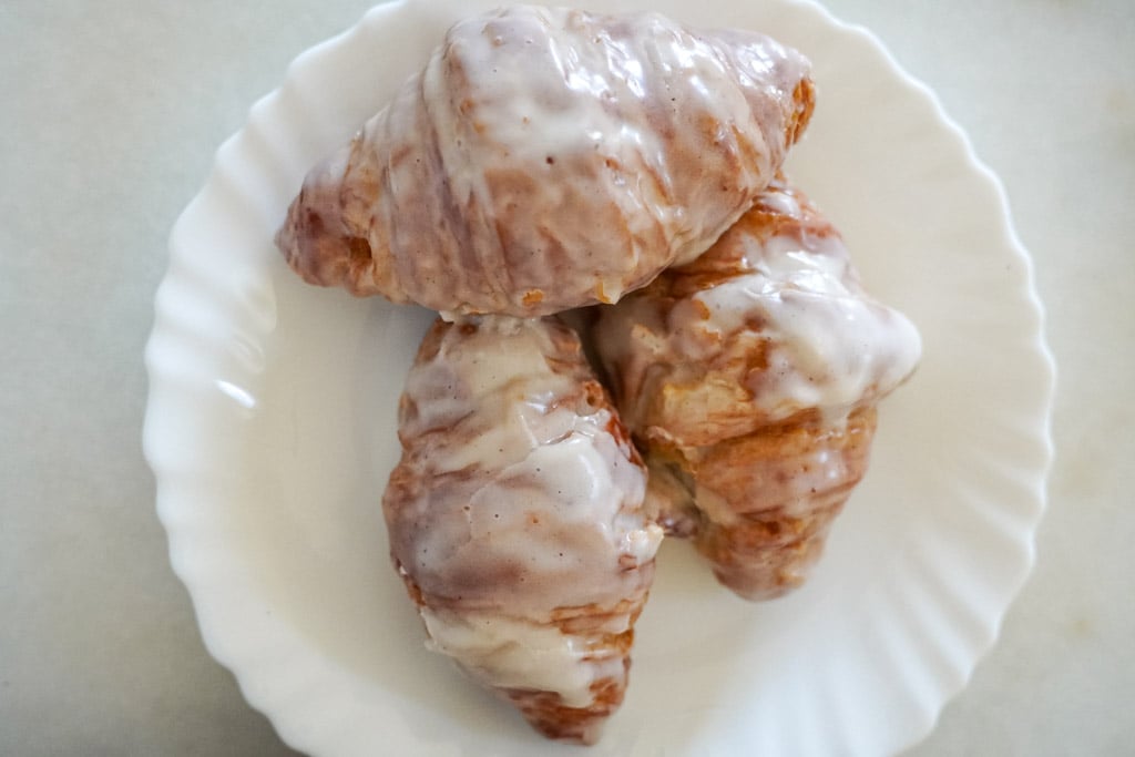 glazed croissants on a plate