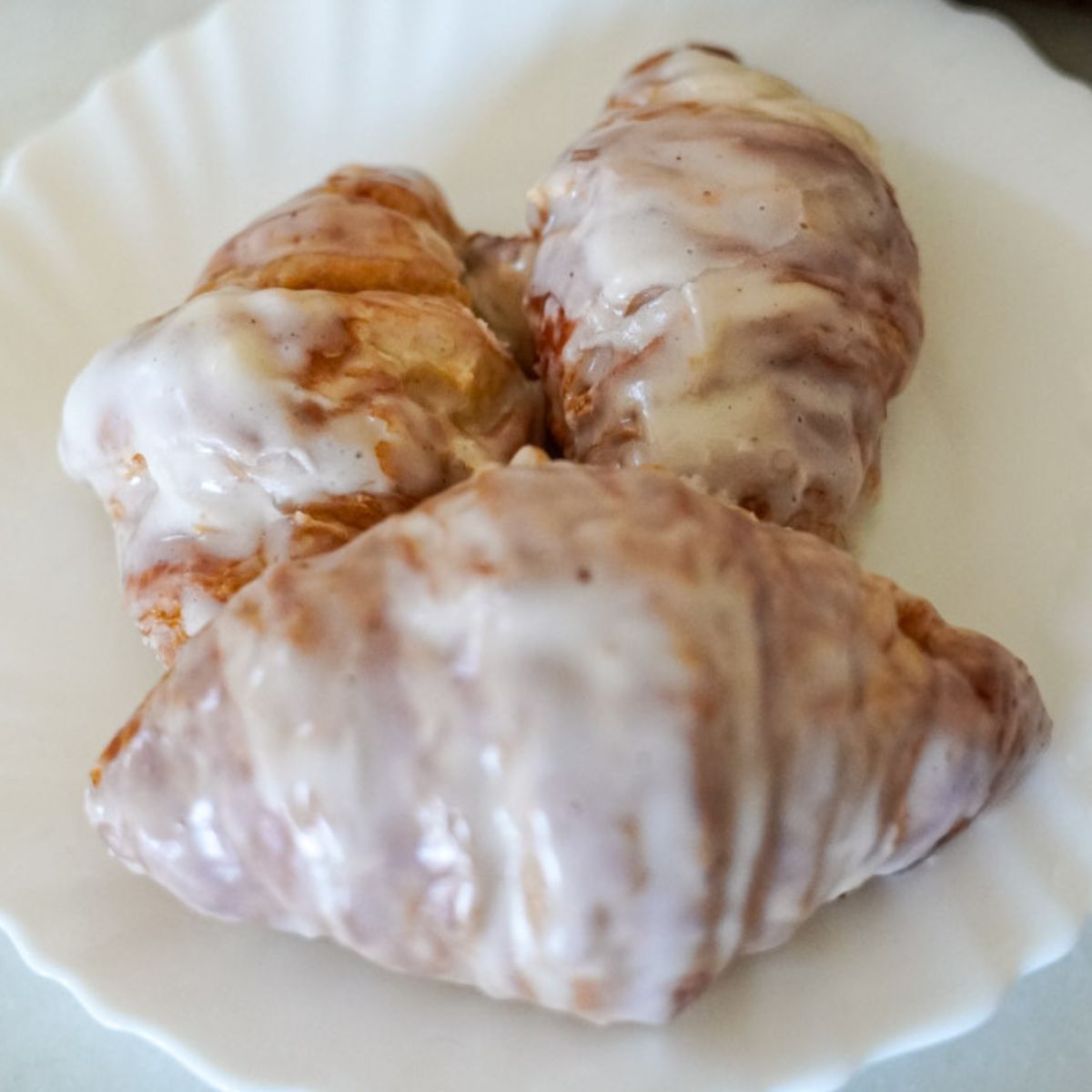 glazed croissants on a plate