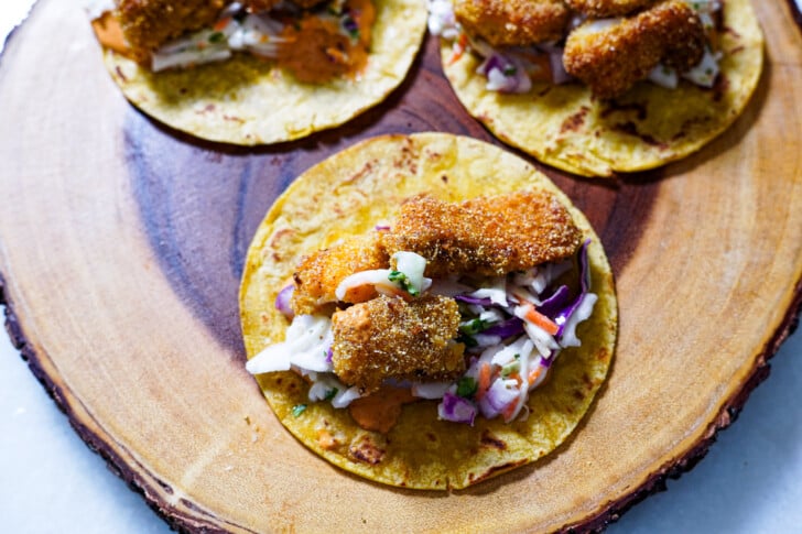 catfish tacos on corn tortillas with coleslaw