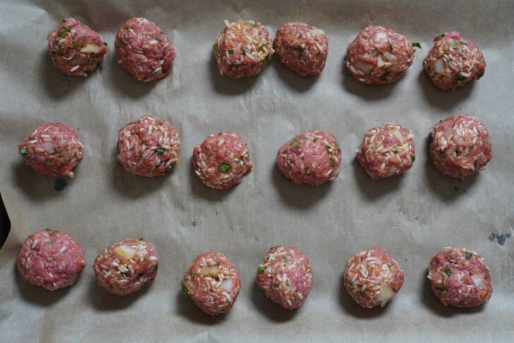 albondigas meatballs on a piece of parchment paper