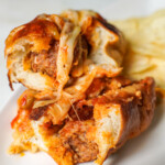 Italian sausage sandwich cut in half