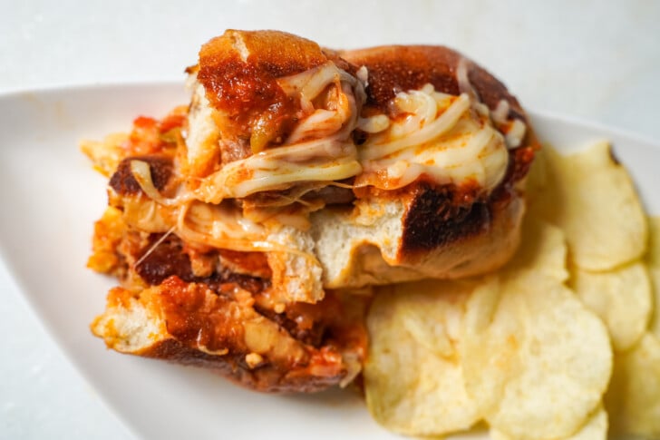 Italian sausage sandwich cut in half