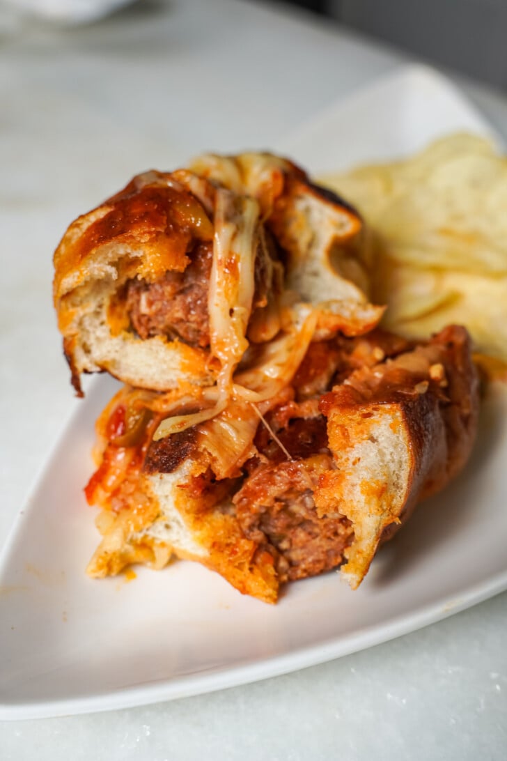 Italian sausage sandwich cut in half