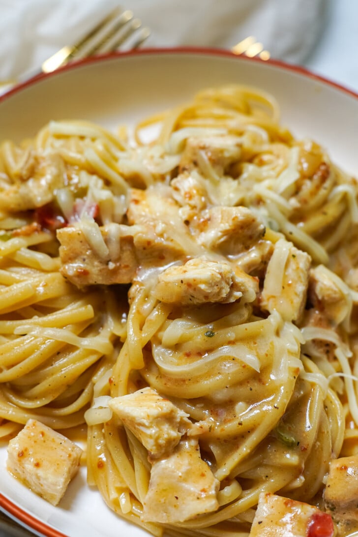 bowl of chicken tetrazzini with forks sitting next to it