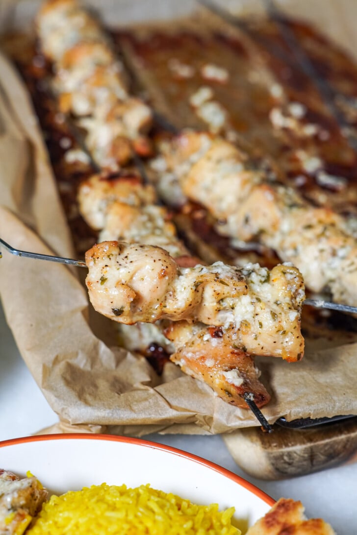 chicken skewers on a sheet pan