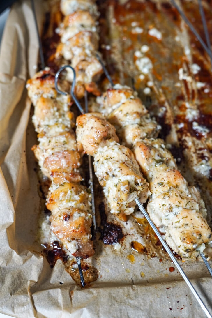 chicken skewers brushed with garlic parmesan mixture