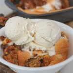 s'mores cookie scooped in a bowl with ice cream on top
