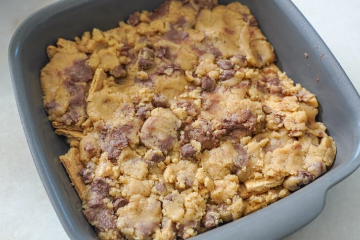 cookie dough in a 9x9 baking dish