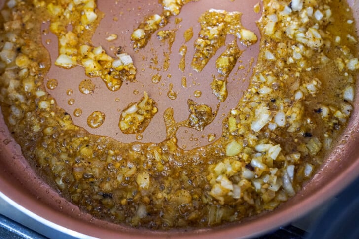 sauteeing onions in a skillet
